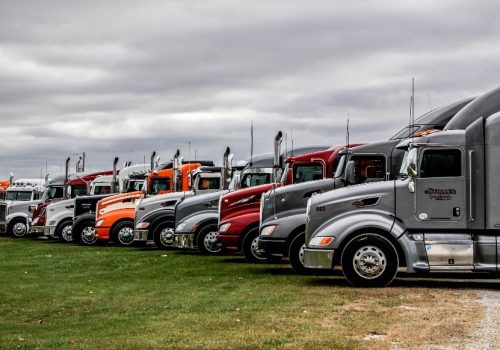 A row of trucks outside of Stoller trucking