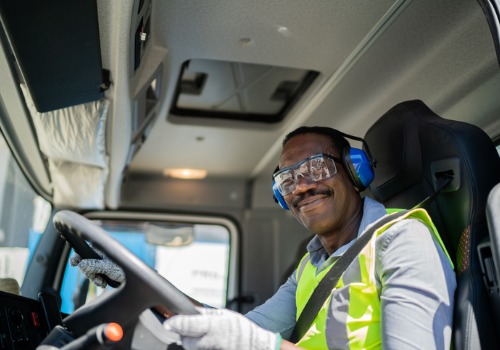 A smiling man enjoying his Truck Driver Jobs in Madison WI